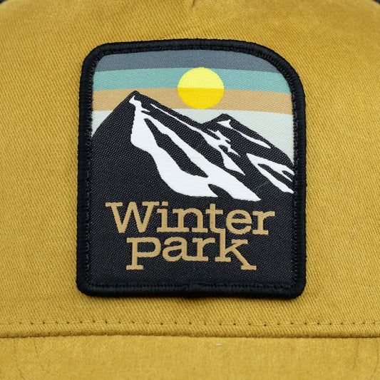 Winter Park Yellow/Black Trucker Hat
