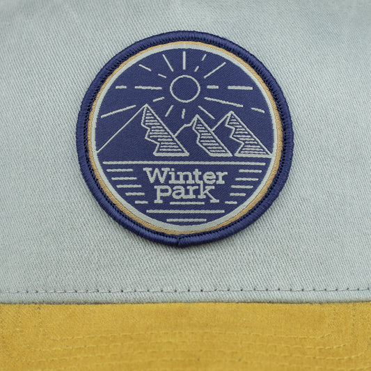 Winter Park Grey/Blue/Yellow Trucker Hat